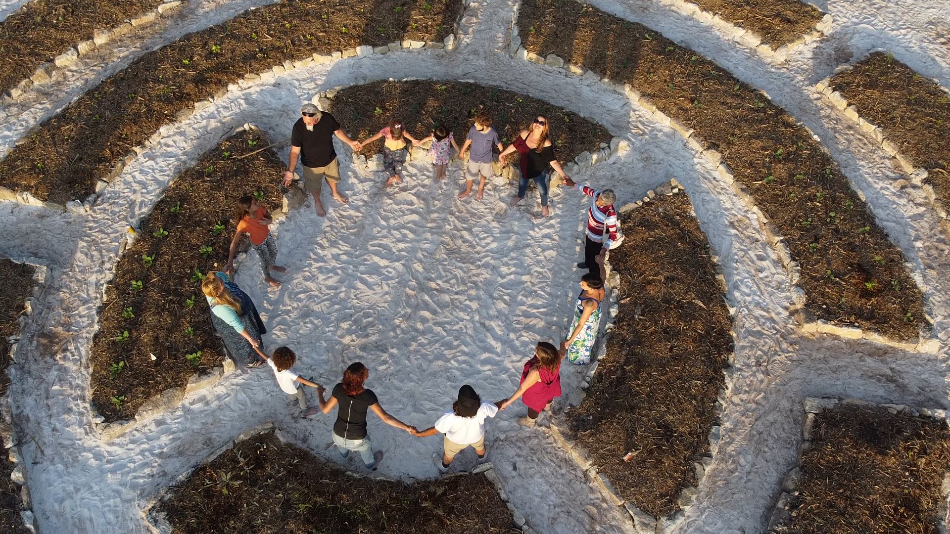 Circle of friends blessing the Mandala Garden