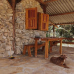Stone cabin with dog