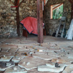 Stone floor under construction in stone cabin
